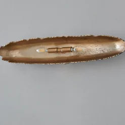 Oumaumau Sconce